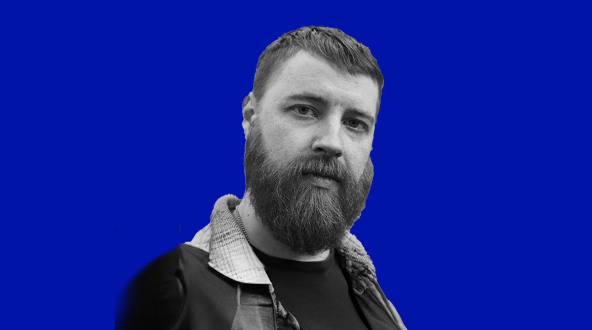 Photo of LoopMe's Artem Koscheev against a blue background