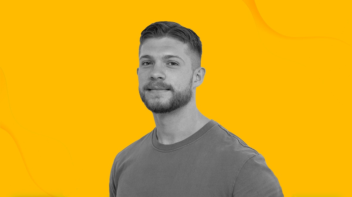 Photo of LoopMe's Theo Alden against a yellow background