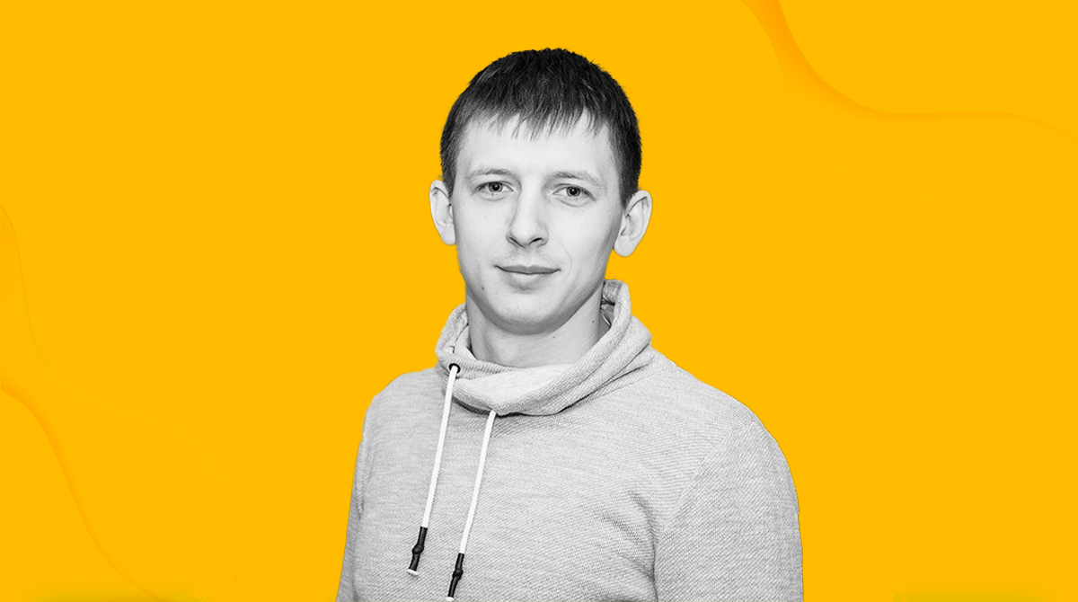 Photo of Oleg Morochkov against a yellow background